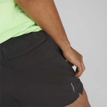 Regular Pantalon de sport 'FAVORITE' PUMA en noir