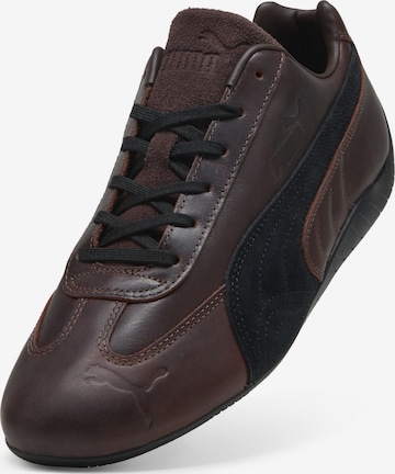 PUMA Sneakers in Brown: front