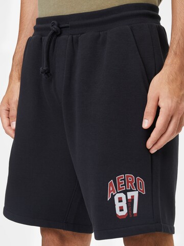 AÉROPOSTALE Regular Trousers in Black