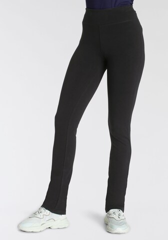 FAYN SPORTS Flared Workout Pants in Black: front
