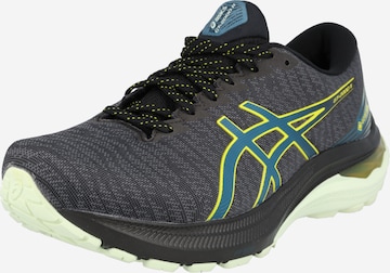 ASICS - Zapatillas de running en gris: frente