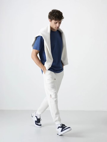 Tommy Life - Skinny Calças de desporto 'Jogginghose' em branco