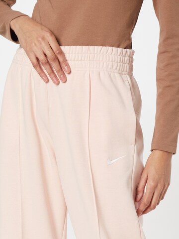 Nike Sportswear Широка кройка Панталон в оранжево