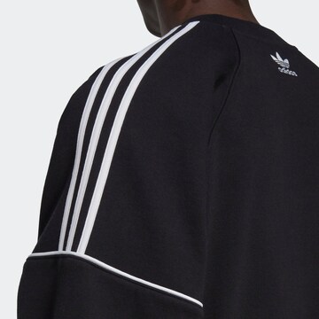 ADIDAS ORIGINALS Collegepaita 'Rekive Crew' värissä musta