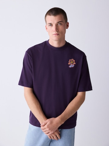 T-Shirt Next en violet : devant