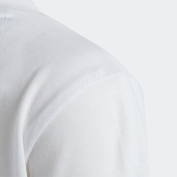 ADIDAS SPORTSWEAR - Camiseta funcional 'Essentials Logo' en blanco