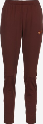 NIKE Slim fit Workout Pants 'Academy' in Brown: front