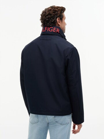 TOMMY HILFIGER Tussenjas in Blauw