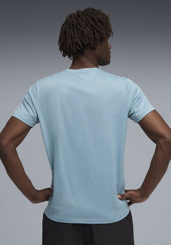 PUMA Performance Shirt 'Tad Essentials' in Blue