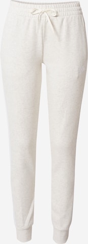 ADIDAS SPORTSWEAR Zwężany krój Spodnie sportowe 'Essentials Fleece 3-Stripes' w kolorze biały: przód