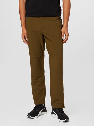 PUMA Regular Sports trousers in Green: front