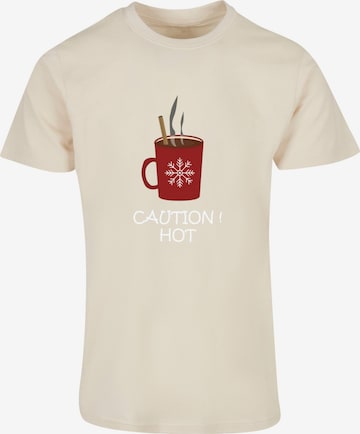 Merchcode Shirt 'Caution Hot' in Beige: voorkant
