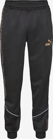 juoda PUMA Siaurėjantis Sportinės kelnės 'KING Anthem': priekis