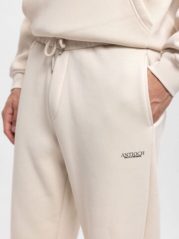Antioch Trainingspak in Beige