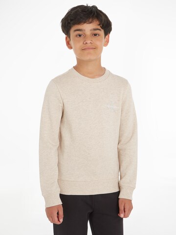 Calvin Klein Jeans Sweatshirt in Bruin: voorkant