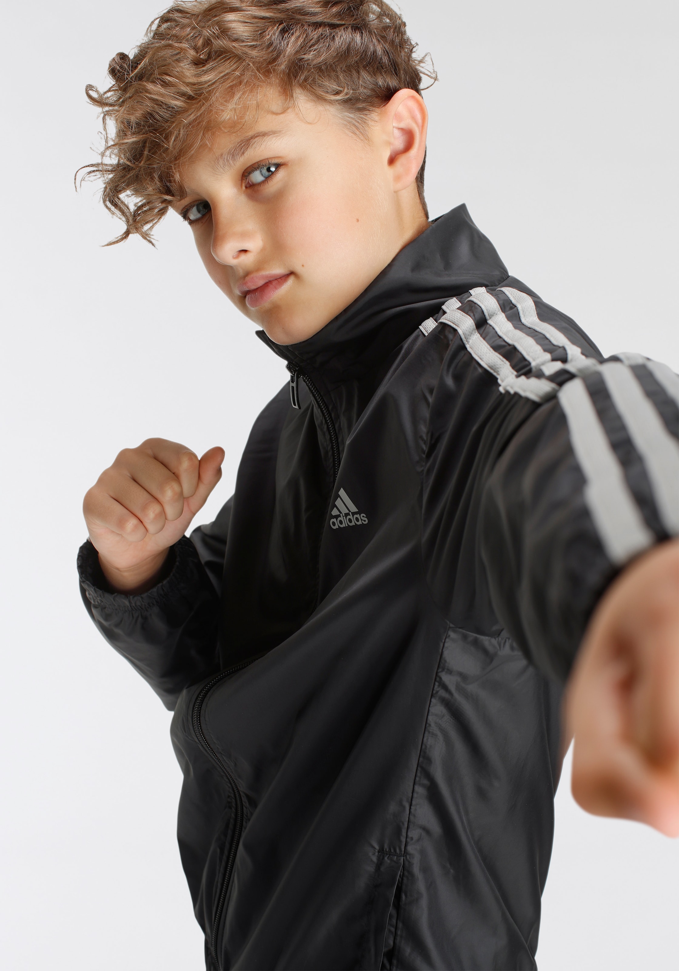 ADIDAS PERFORMANCE Tracksuit Essentials in Black ABOUT YOU