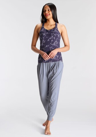 FAYN SPORTS Tapered Sporthose in Lila