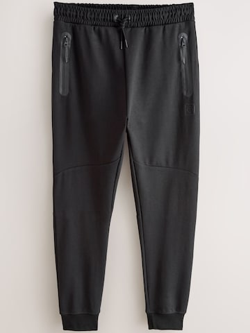 Tapered Pantaloni di Next in grigio