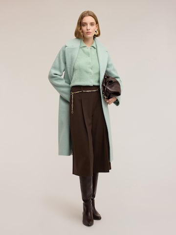 MOTIVI Tapered Broek in Bruin