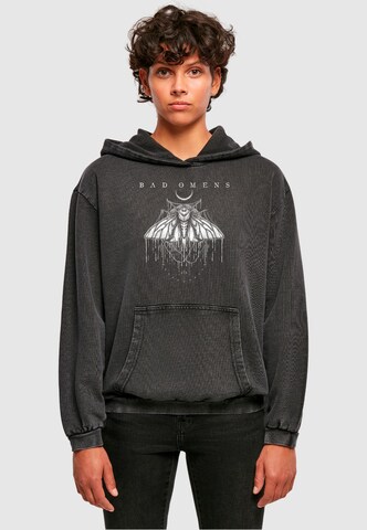 Merchcode Sweatshirt 'Bad Omens' in Black: front