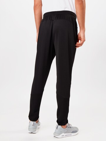 Coupe slim Pantalon de sport ELLESSE en noir