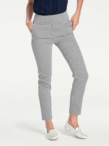 Skinny Pantaloni de la heine pe negru: față