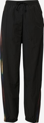 ADIDAS ORIGINALS Tapered Trousers in Black: front