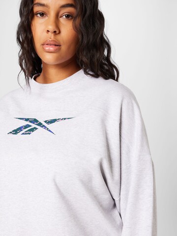 Reebok - Sweatshirt de desporto em cinzento