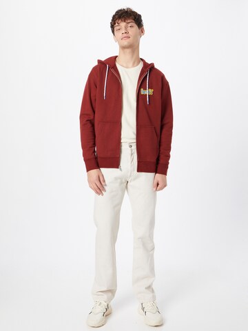 LEVI'S ® Sweatjacka 'Relaxed Graphic Zipup' i röd