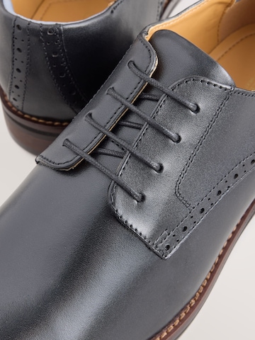 Chaussure à lacets Next en noir