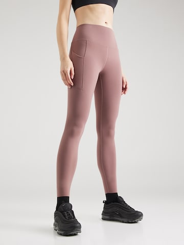 Regular Pantalon de sport 'UNIVERSA' NIKE en marron : devant