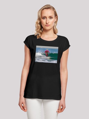 F4NT4STIC Shirt 'Batman TV Serie Joker Surfing' in Zwart: voorkant