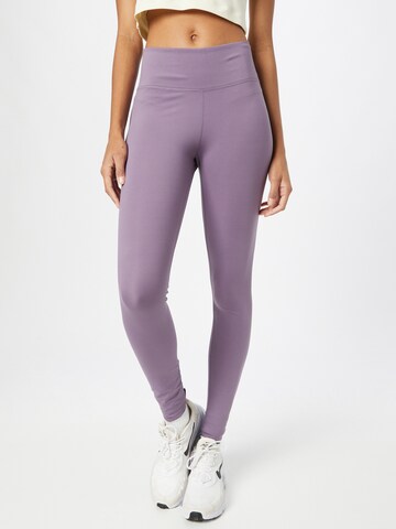 NIKE Skinny Workout Pants in Purple: front