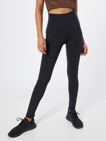 Girlfriend Collective Skinny Sportbroek 'RESET' in Zwart: voorkant