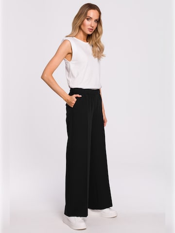 made of emotion - Loosefit Pantalón de pinzas en negro