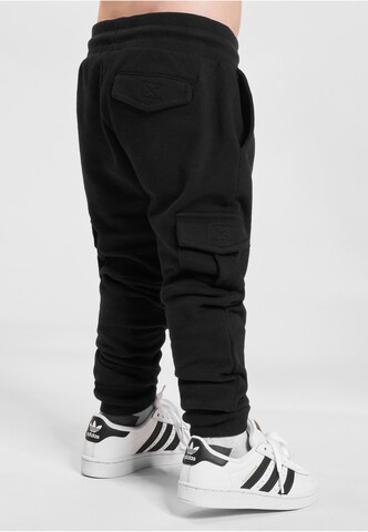 Tapered Pantaloni di Urban Classics in nero