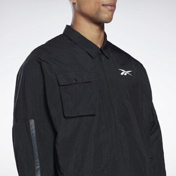 Reebok - Chaqueta deportiva en negro