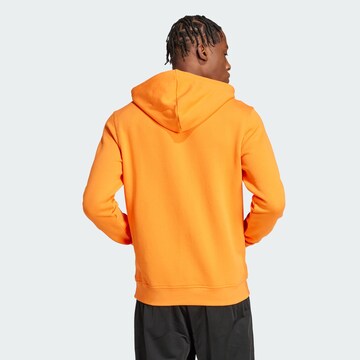 ADIDAS ORIGINALS Sweatshirt 'Essentials' in Orange
