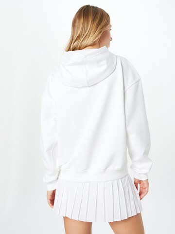 NIKE Sport sweatshirt i vit