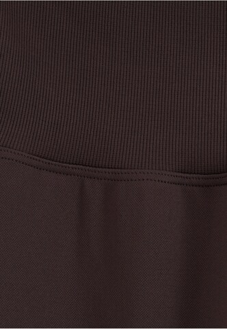 Flared Pantaloni sportivi 'Chocolate' di Aim'n in marrone