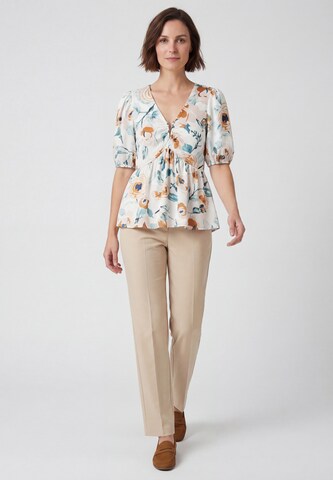 Usha - Blusa en blanco