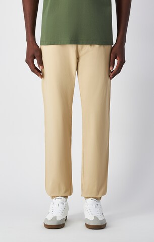 Champion Authentic Athletic Apparel Tapered Pants in Beige: front