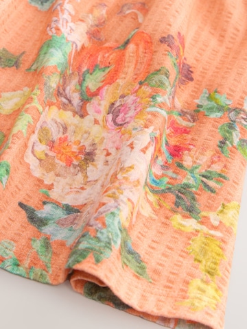 Robe Next en orange