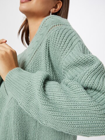 ABOUT YOU Sweater 'Emilia' in Green