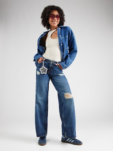 GUESS JEANS Zvonové kalhoty Džíny – modrá