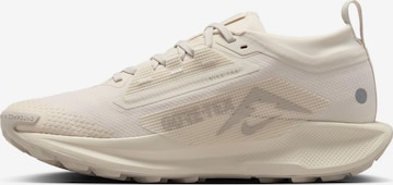 NIKE Running Shoes 'PegasusTrail 5' in Beige: front