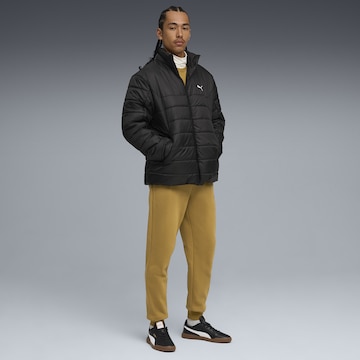 PUMA Tapered Workout Pants 'Essentials 2 No.1' in Brown