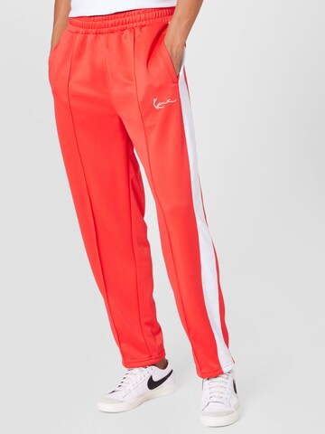 Karl Kani Regular Pants in Red: front