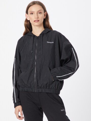 Reebok - Chaqueta deportiva en negro: frente