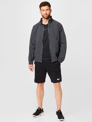 Nike Sportswear - Casaco meia-estação em cinzento